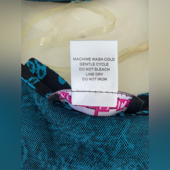 Black Paper Doll Skater Dress with Blue Floral Pattern - Picture 7 of 7